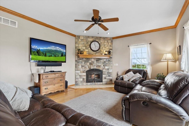 2583 Countryside Ln, Richfield, WI 53076 - living room featuring wood finished floors, ceiling fan, crown molding, a fireplace, and baseboards