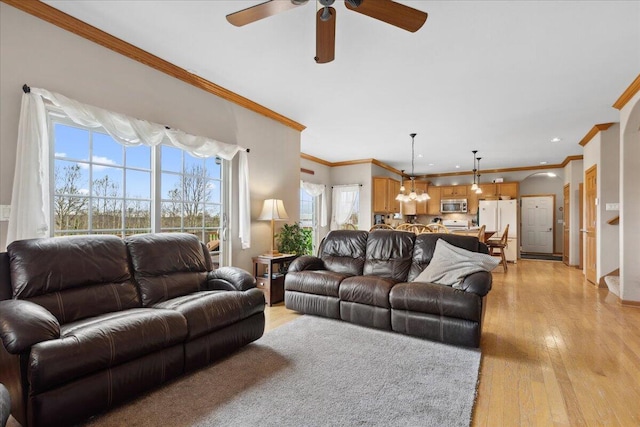 2583 Countryside Ln, Richfield, WI 53076 - living room featuring ceiling fan, light wood-type flooring, ornamental molding, a chandelier, and recessed lighting