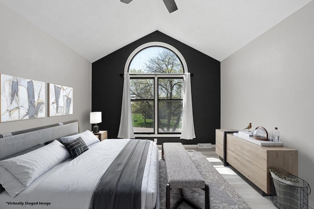 3927 Southwyck Ct, Janesville, WI 53546 - bedroom featuring light wood finished floors, lofted ceiling, and a ceiling fan
