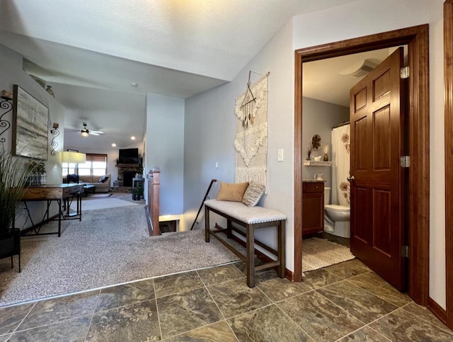 3960 Scenic Way Unit 4, Franksville, WI 53126 - hall featuring dark stone finish flooring and baseboards
