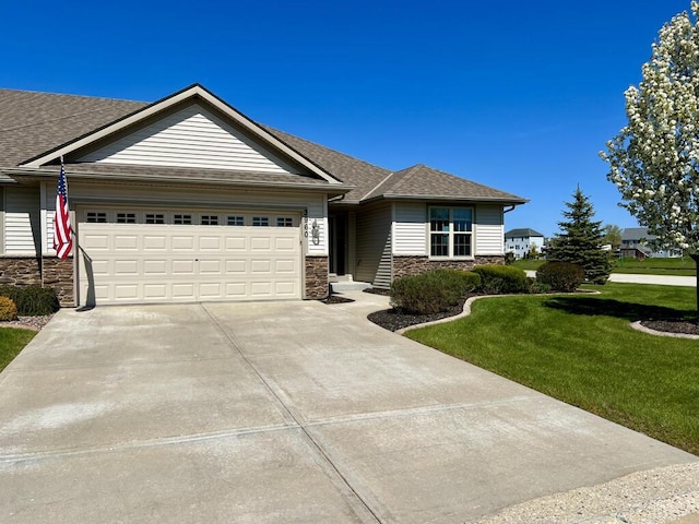 3960 Scenic Way Unit 4, Franksville, WI 53126 - single story home with stone siding, a garage, and driveway