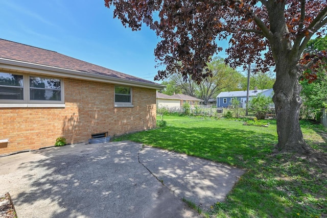 view of yard with a patio area