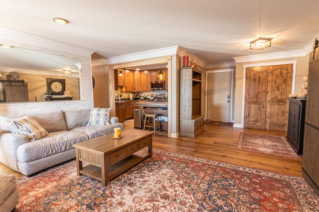 1212 Grand Ave Unit # 30, Wausau, WI 54403 - living room with wood finished floors, crown molding, and baseboards