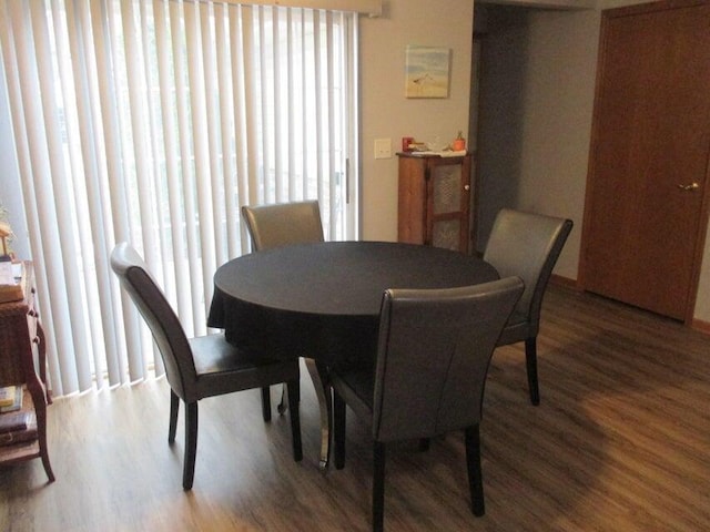 dining room with wood finished floors