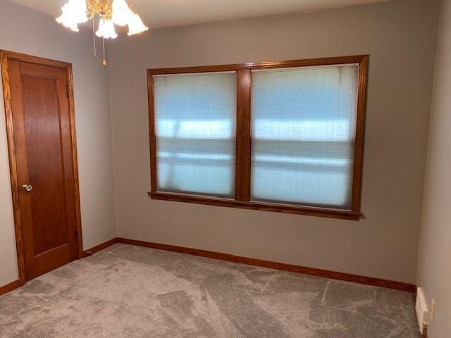 301 E Coldspring Ave, Madison, WI 53716 - empty room featuring light colored carpet and baseboards