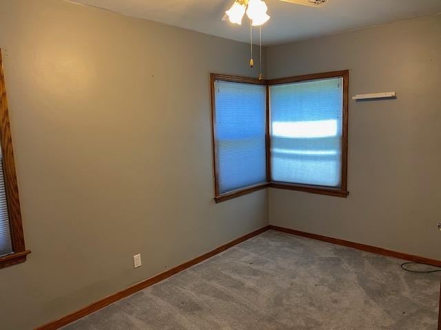 301 E Coldspring Ave, Madison, WI 53716 - empty room with ceiling fan, light colored carpet, and baseboards