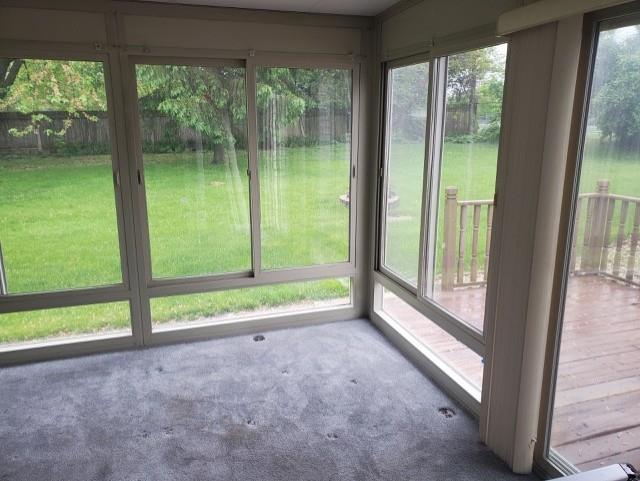 301 E Coldspring Ave, Madison, WI 53716 - unfurnished sunroom with carpet