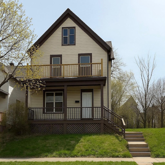 3332 N Richards St, Milwaukee, WI 53212 - view of front of home featuring a balcony, covered porch, stairway, and a front yard