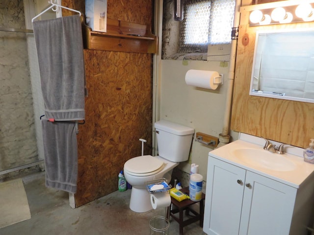 944 9th St, Beloit, WI 53511 - full bathroom with concrete flooring, toilet, a shower with curtain, and vanity