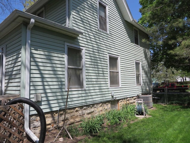 944 9th St, Beloit, WI 53511 - view of side of home with central AC