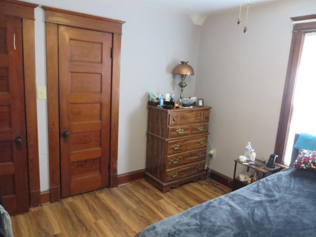 944 9th St, Beloit, WI 53511 - bedroom with wood finished floors and baseboards