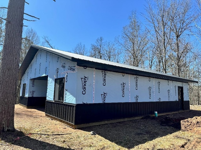 29075 Deerpath Pass, Danbury, WI 54830 - view of home's exterior featuring metal roof and stucco siding