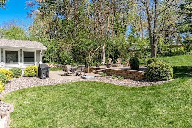 7929 N Pine View Dr, Edgerton, WI 53534 - view of grassy yard featuring a patio area