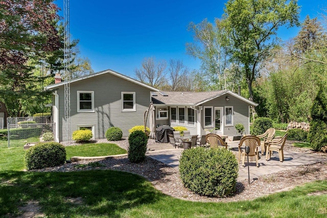 7929 N Pine View Dr, Edgerton, WI 53534 - back of house with a patio area, entry steps, and a chimney