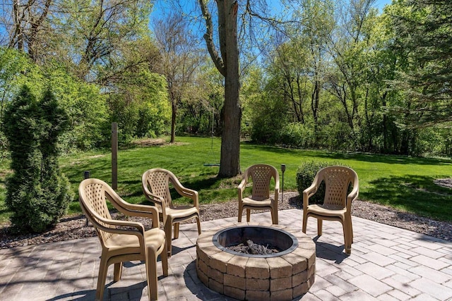 7929 N Pine View Dr, Edgerton, WI 53534 - view of patio featuring a fire pit