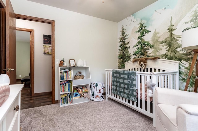 7929 N Pine View Dr, Edgerton, WI 53534 - bedroom with a nursery area, carpet, and baseboards