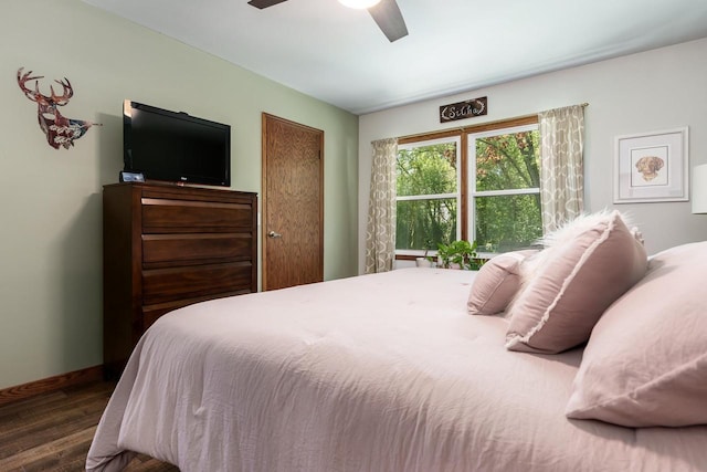 7929 N Pine View Dr, Edgerton, WI 53534 - bedroom featuring wood finished floors, a ceiling fan, and baseboards