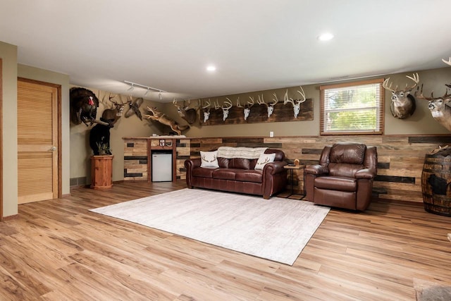7929 N Pine View Dr, Edgerton, WI 53534 - living room featuring light wood-style flooring, wainscoting, and recessed lighting