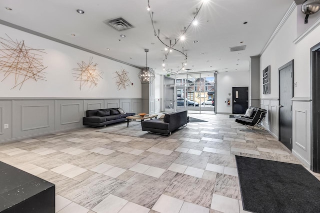 601 E Ogden Ave Unit 803, Milwaukee, WI 53202 - building lobby featuring a decorative wall and ornamental molding