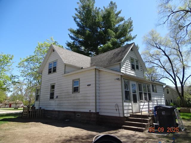 413 S Howard St, Princeton, WI 54968 - view of home's exterior featuring roof with shingles