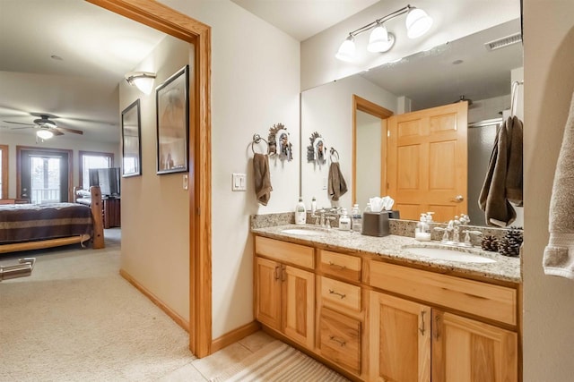 1839-6 20th Blvd Unit 0206, Arkdale, WI 54613 - full bathroom featuring ceiling fan, ensuite bath, double vanity, and baseboards