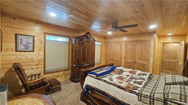 9138 W Johnson Rd, Hayward, WI 54843 - carpeted bedroom featuring wooden ceiling, wooden walls, recessed lighting, and a ceiling fan