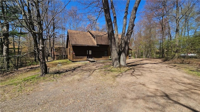 9138 W Johnson Rd, Hayward, WI 54843 - view of front of house with dirt driveway