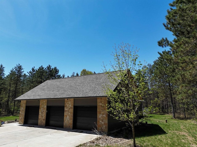 2191 County Road G, Nekoosa, WI 54457 - garage featuring driveway