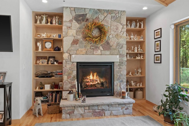 2191 County Road G, Nekoosa, WI 54457 - detailed view of wood finished floors, a fireplace, and built in features