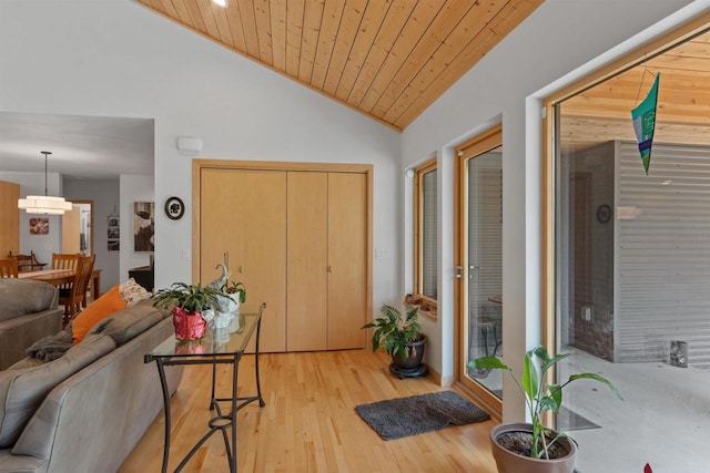 2191 County Road G, Nekoosa, WI 54457 - living area with wooden ceiling, vaulted ceiling, and light wood-style flooring