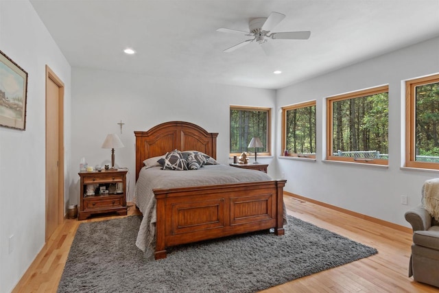 2191 County Road G, Nekoosa, WI 54457 - bedroom with light wood-style floors, recessed lighting, baseboards, and ceiling fan
