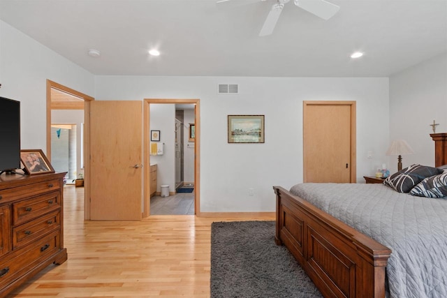 2191 County Road G, Nekoosa, WI 54457 - bedroom featuring light wood-style floors, recessed lighting, a ceiling fan, and connected bathroom
