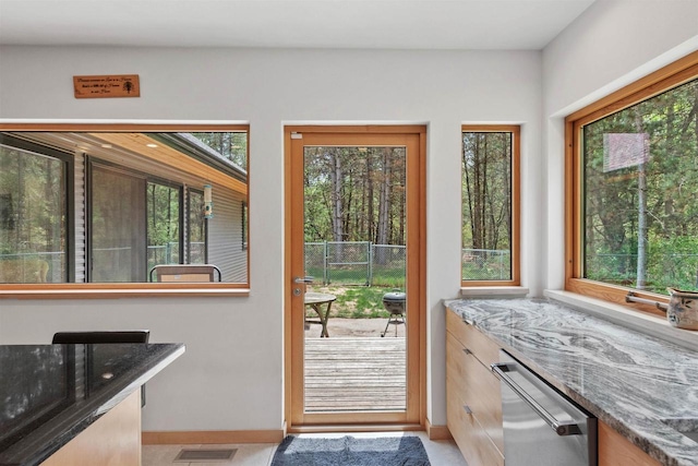 2191 County Road G, Nekoosa, WI 54457 - doorway to outside featuring plenty of natural light and baseboards