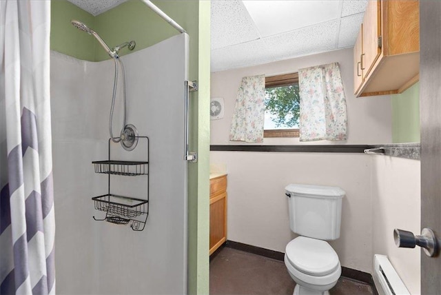 E7065 County Road B, Colfax, WI 54730 - full bathroom with a baseboard heating unit, a shower with shower curtain, toilet, baseboards, and a drop ceiling
