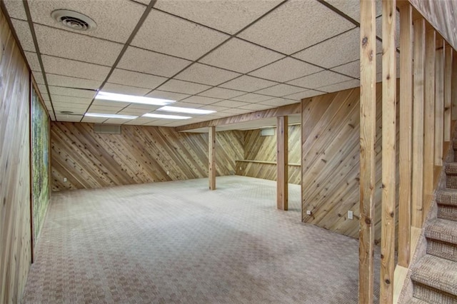 1206 Nixon Ave, Eau Claire, WI 54701 - finished basement featuring carpet flooring, wood walls, and stairway
