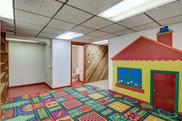 1206 Nixon Ave, Eau Claire, WI 54701 - playroom featuring wood walls and a paneled ceiling