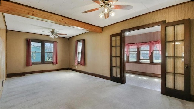 41 E Euclid Ave, Barron, WI 54812 - carpeted spare room with baseboards, ceiling fan, french doors, and beamed ceiling