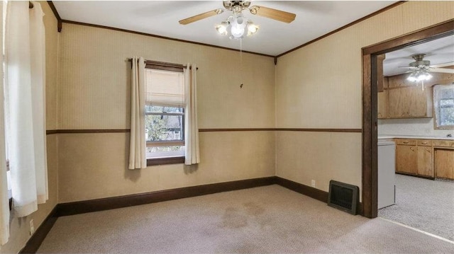 41 E Euclid Ave, Barron, WI 54812 - empty room featuring ceiling fan, ornamental molding, light carpet, and baseboards