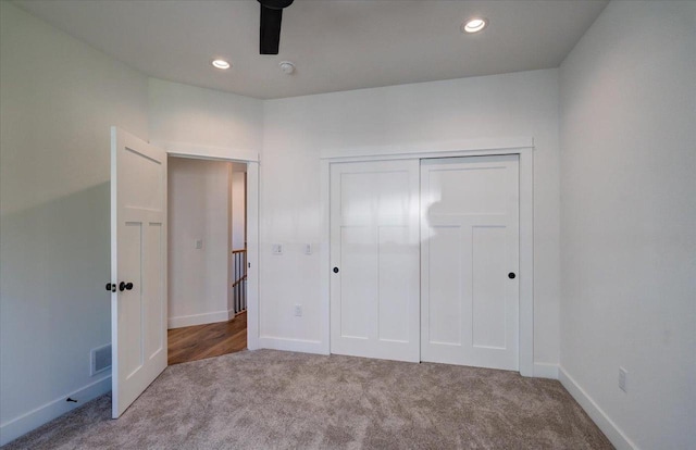 713 Kennedy St, Sauk City, WI 53583 - unfurnished bedroom with carpet, a closet, recessed lighting, and baseboards