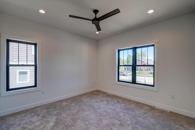 713 Kennedy St, Sauk City, WI 53583 - carpeted spare room featuring ceiling fan, recessed lighting, and baseboards