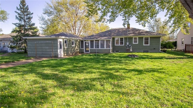 1408 E Lexington Blvd, Eau Claire, WI 54701 - rear view of property with a lawn