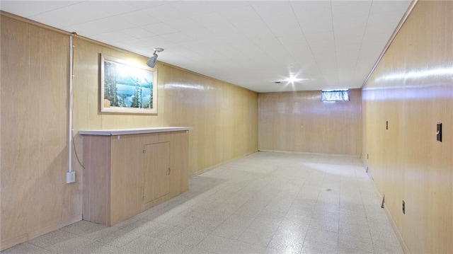 1408 E Lexington Blvd, Eau Claire, WI 54701 - below grade area with wooden walls and light floors