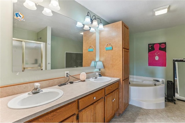 2136 62nd St, Somerset, WI 54025 - bathroom featuring double vanity, a bath, a shower stall, and tile patterned floors