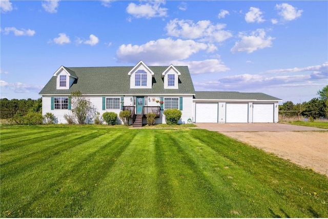 2136 62nd St, Somerset, WI 54025 - new england style home with driveway, a front yard, and a garage