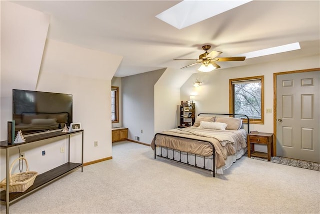 1813 Abbe Hill Dr, Eau Claire, WI 54703 - bedroom with a skylight, light colored carpet, baseboards, and ceiling fan