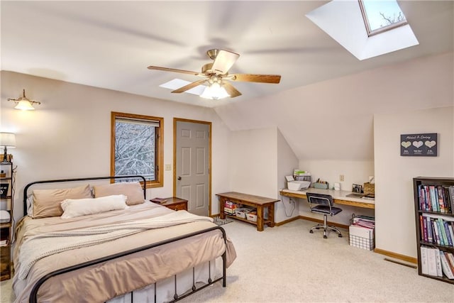 1813 Abbe Hill Dr, Eau Claire, WI 54703 - bedroom featuring a desk, carpet, a skylight, vaulted ceiling, and baseboards