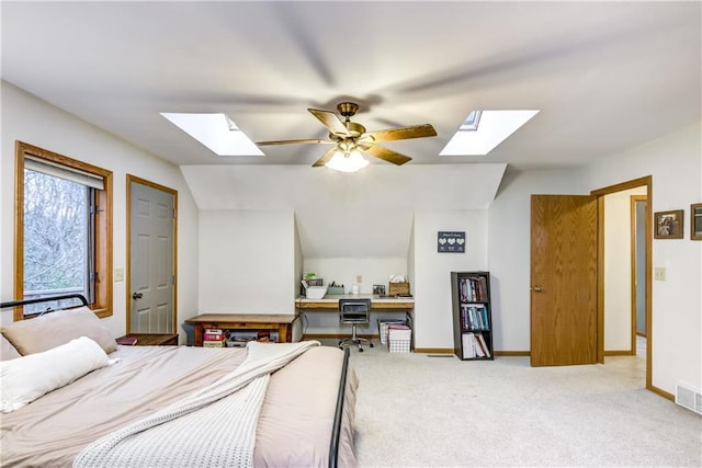 1813 Abbe Hill Dr, Eau Claire, WI 54703 - bedroom featuring a skylight, carpet flooring, an office area, and baseboards