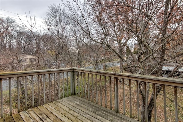 1813 Abbe Hill Dr, Eau Claire, WI 54703 - wooden deck featuring view of scattered trees