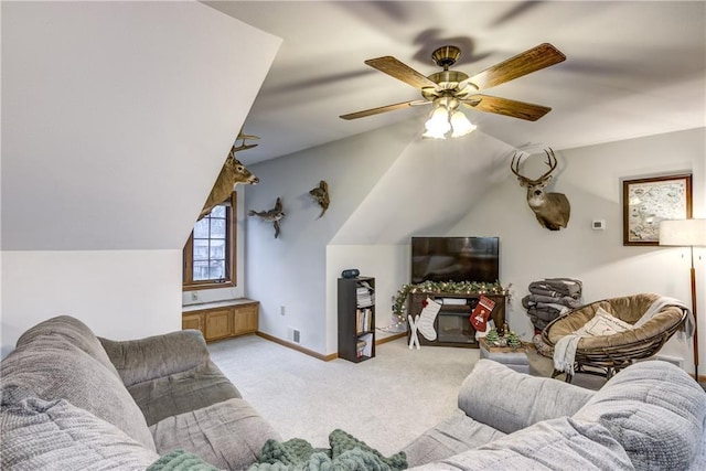 1813 Abbe Hill Dr, Eau Claire, WI 54703 - living room featuring lofted ceiling, light carpet, a ceiling fan, and baseboards