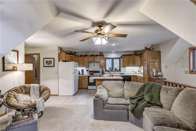 1813 Abbe Hill Dr, Eau Claire, WI 54703 - living room featuring ceiling fan, light tile patterned floors, and baseboards